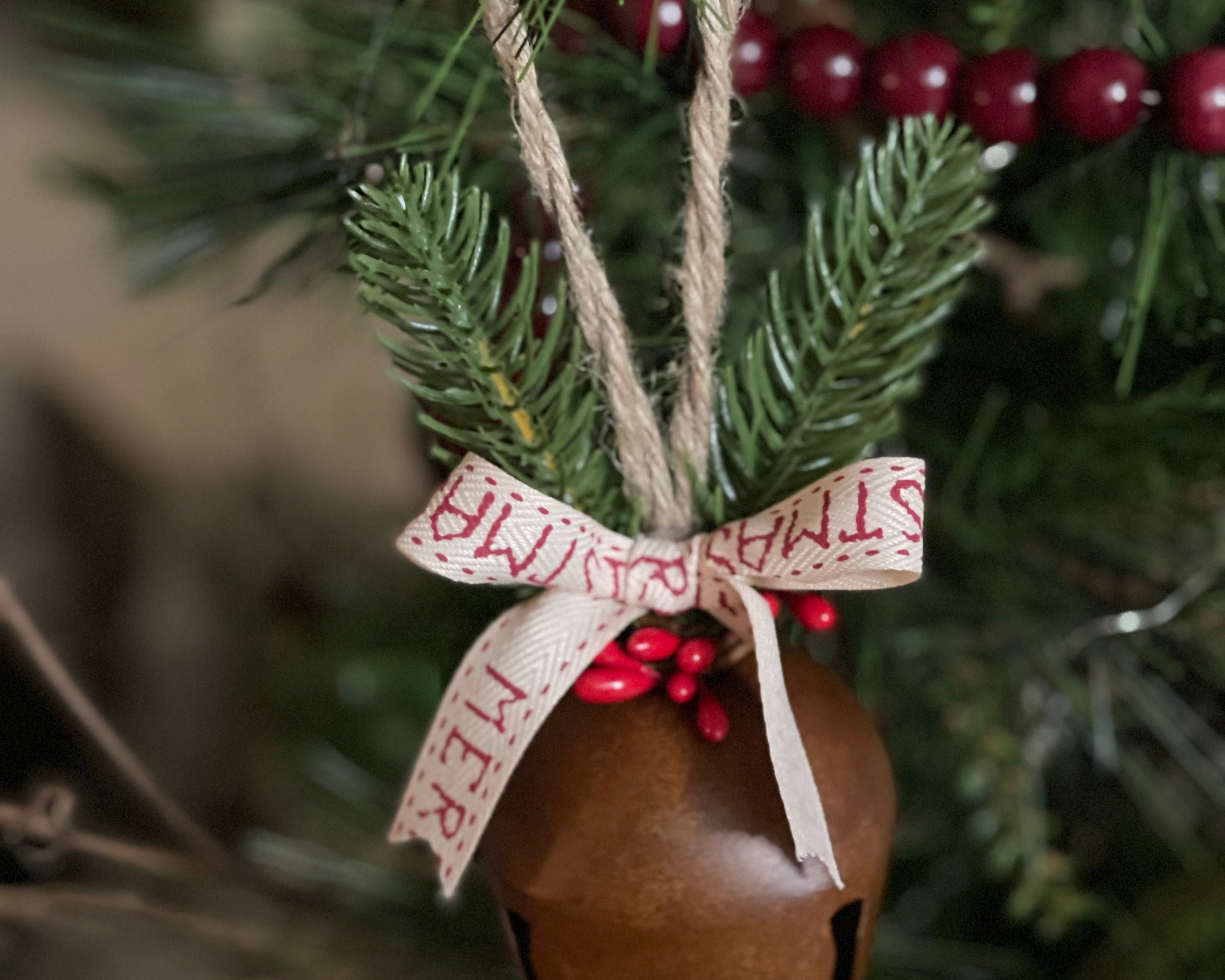 This beautiful rustic jingle bell can be hung as is or you can add a customized name or year.  If you'd like to add a customized saying, please make a note in the note section once added to your cart.