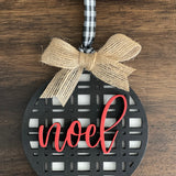 This is the black plaid noel ornament with a twine bow,
