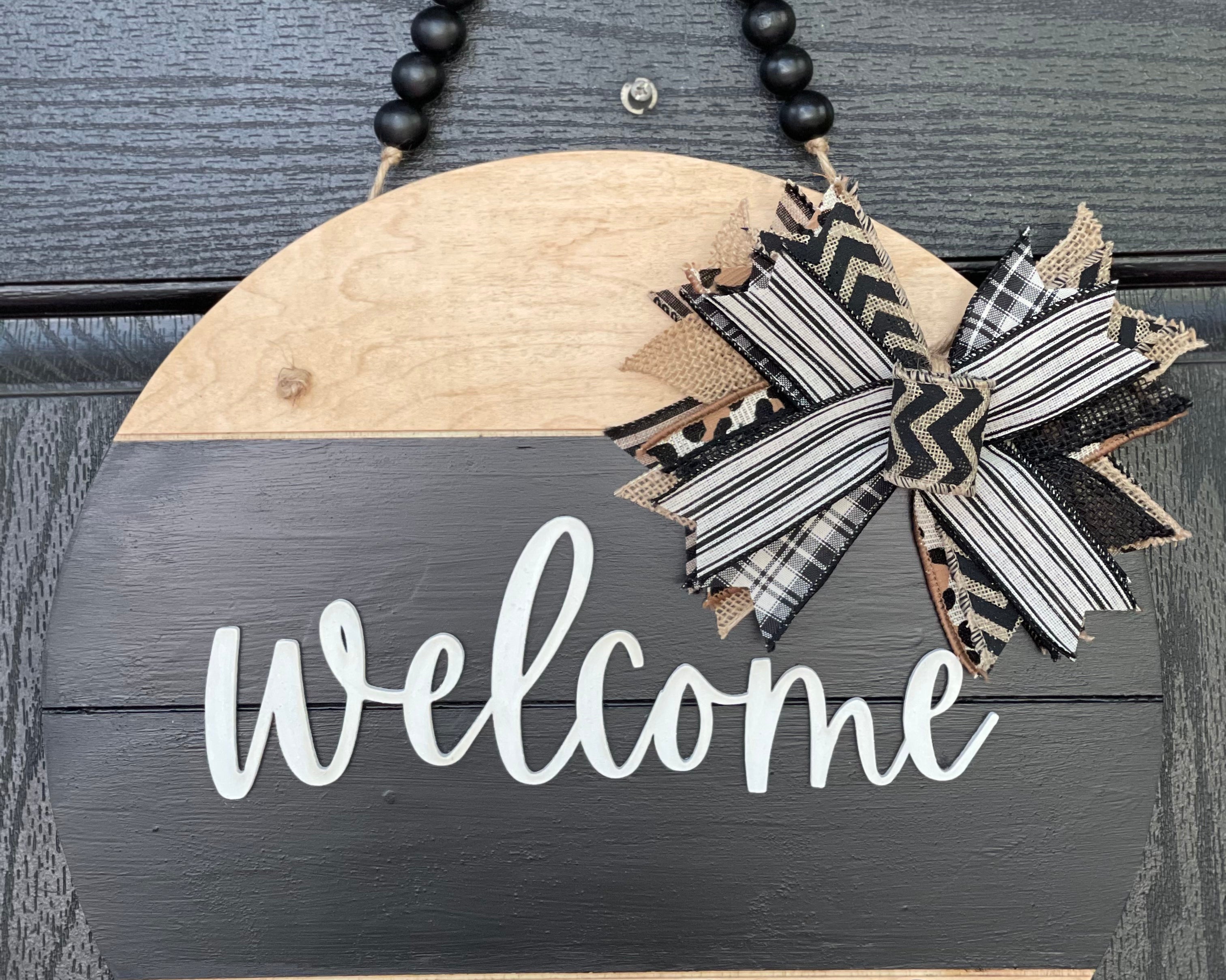 Welcome Shiplap Door or Wall Hanger with Leopard Print shows the 15" round hanging on a front door.